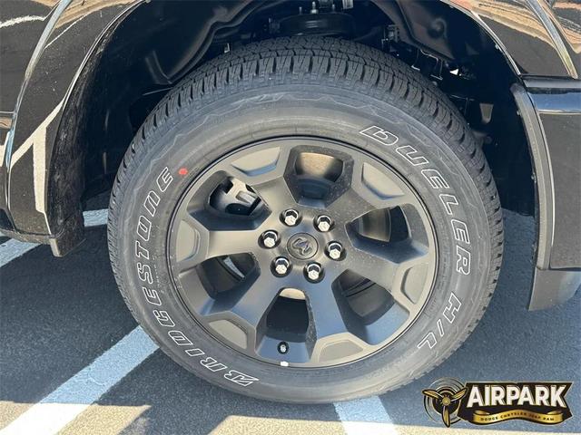 Photo of 2025 Diamond Black Crystal Pearlcoat RAM 1500