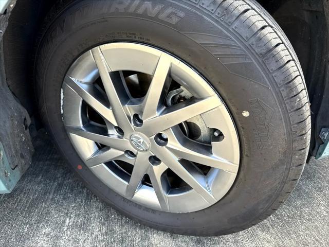 Photo of 2015 Light Green Toyota Prius v
