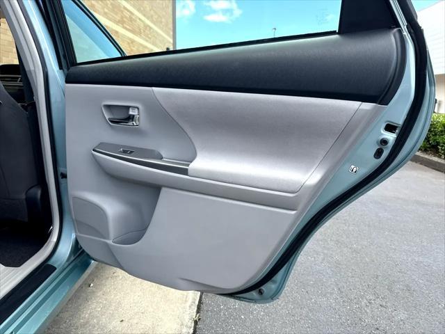 Photo of 2015 Light Green Toyota Prius v