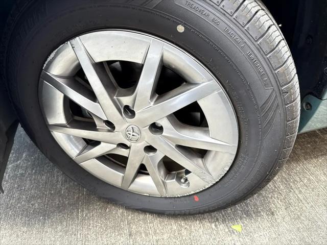 Photo of 2015 Light Green Toyota Prius v