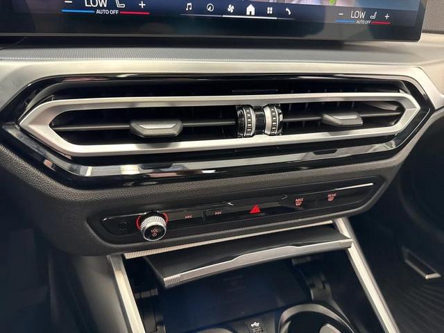 Photo of 2024 Black Sapphire Metallic BMW i4 Gran Coupe