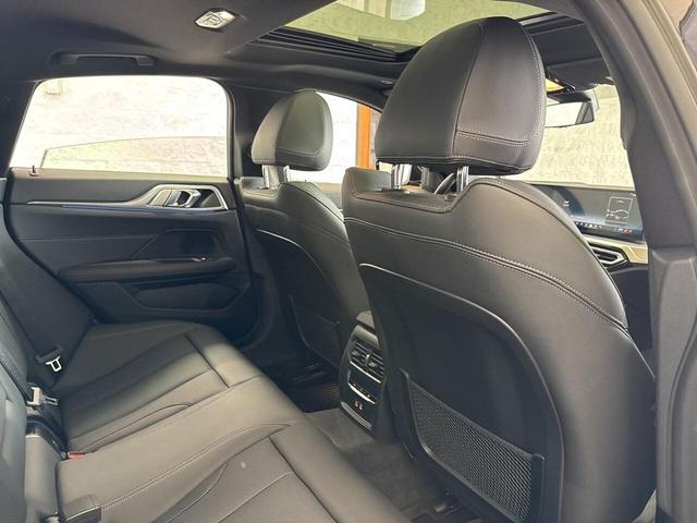 Photo of 2024 Black Sapphire Metallic BMW i4 Gran Coupe