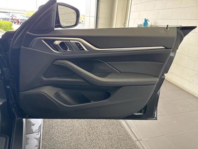 Photo of 2024 Black Sapphire Metallic BMW i4 Gran Coupe