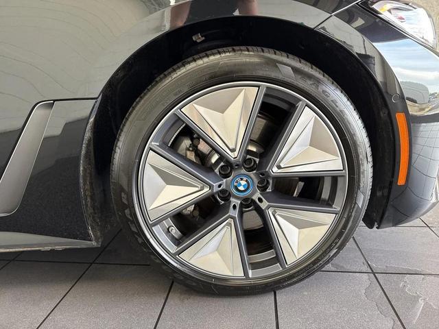 Photo of 2024 Black Sapphire Metallic BMW i4 Gran Coupe