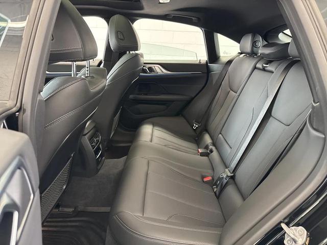 Photo of 2024 Black Sapphire Metallic BMW i4 Gran Coupe