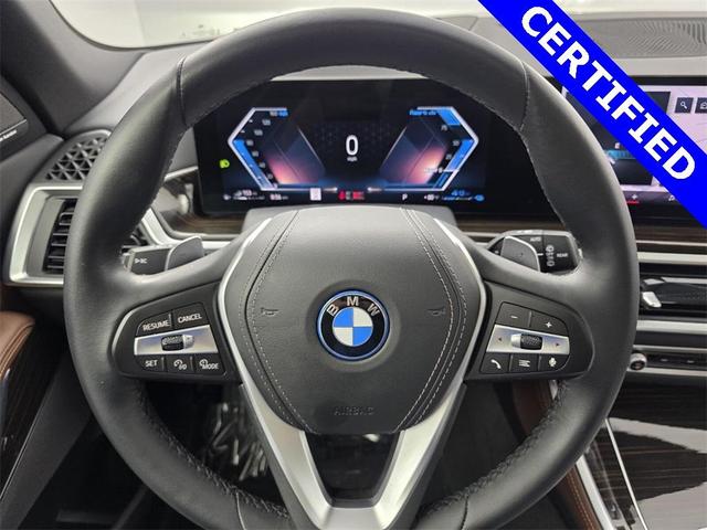 Photo of 2024 Manhattan Green Metallic BMW X5 PHEV