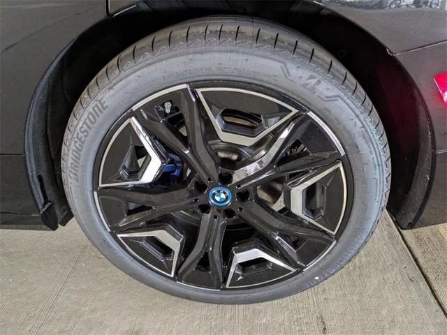 Photo of 2025 Black Sapphire Metallic BMW iX