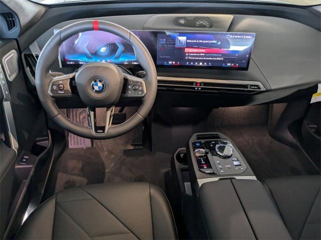 Photo of 2025 Black Sapphire Metallic BMW iX