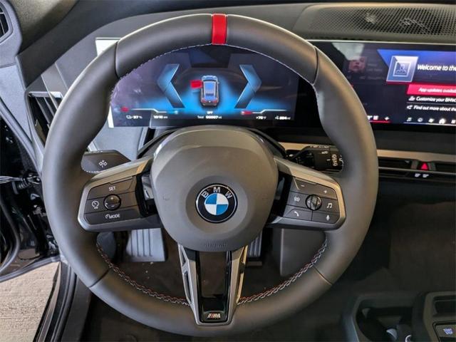 Photo of 2025 Black Sapphire Metallic BMW iX