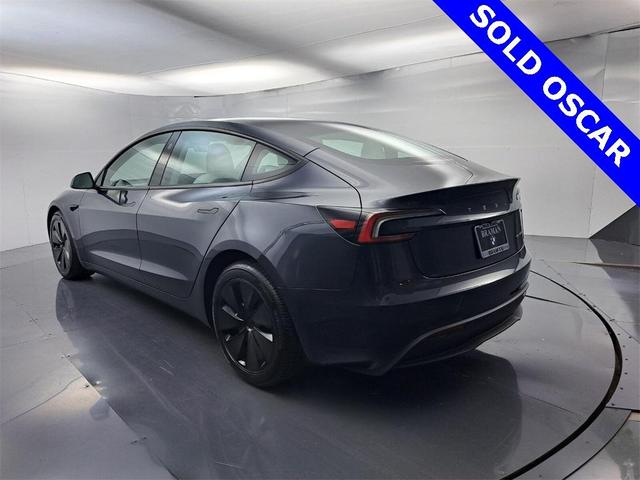 Photo of 2025 Stealth Gray Tesla Model 3