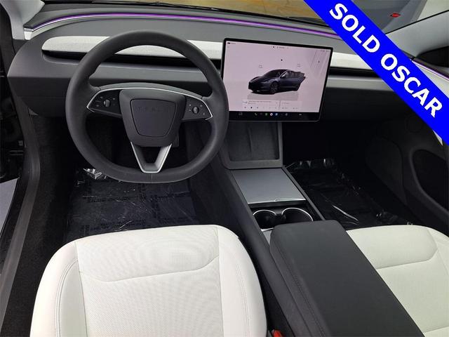 Photo of 2025 Stealth Gray Tesla Model 3