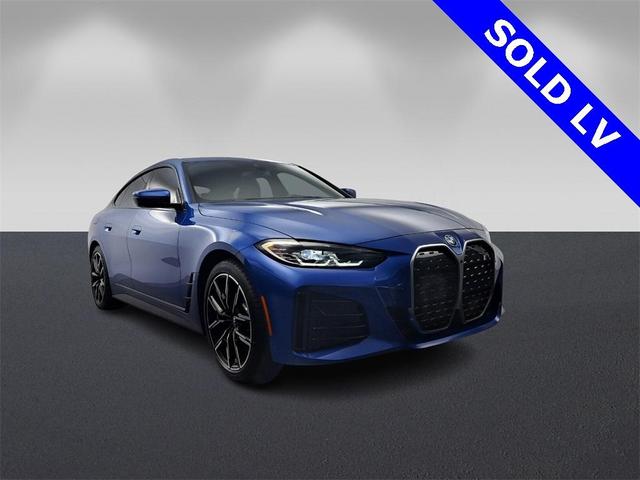 Photo of 2022 Portimao Blue Metallic BMW i4 Gran Coupe