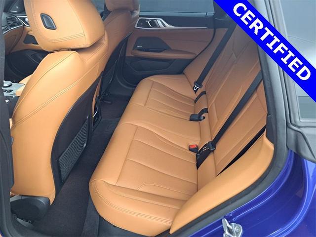 Photo of 2022 Portimao Blue Metallic BMW i4 Gran Coupe