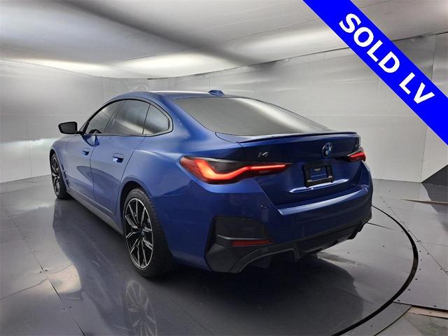 Photo of 2022 Portimao Blue Metallic BMW i4 Gran Coupe