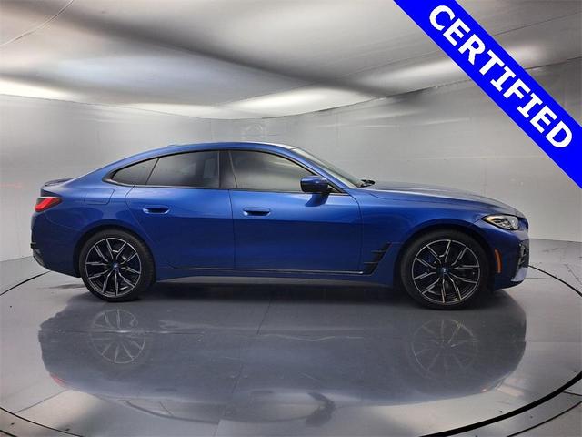 Photo of 2022 Portimao Blue Metallic BMW i4 Gran Coupe