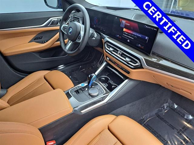 Photo of 2022 Portimao Blue Metallic BMW i4 Gran Coupe