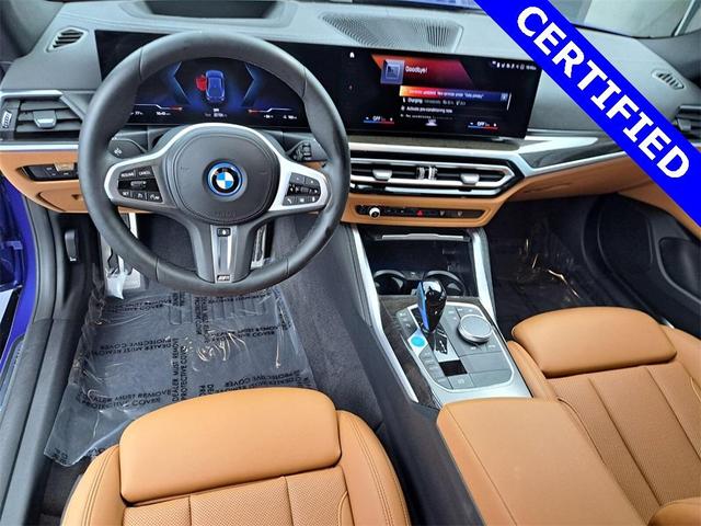 Photo of 2022 Portimao Blue Metallic BMW i4 Gran Coupe