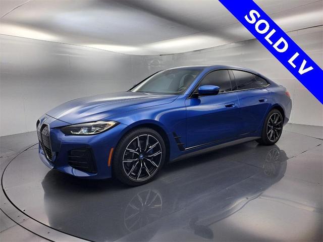 Photo of 2022 Portimao Blue Metallic BMW i4 Gran Coupe