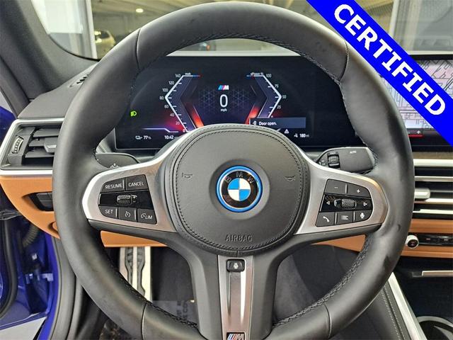 Photo of 2022 Portimao Blue Metallic BMW i4 Gran Coupe