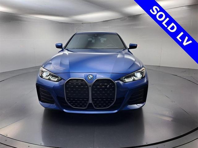 Photo of 2022 Portimao Blue Metallic BMW i4 Gran Coupe