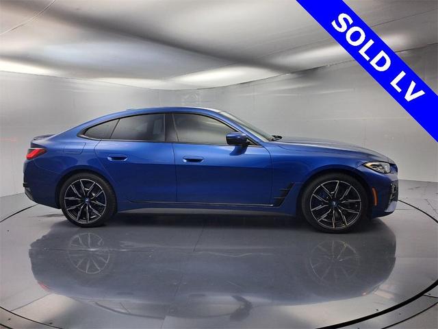 Photo of 2022 Portimao Blue Metallic BMW i4 Gran Coupe