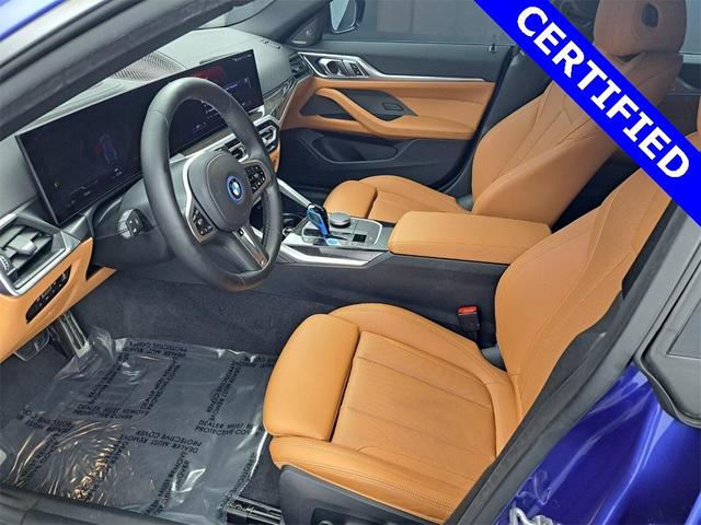 Photo of 2022 Portimao Blue Metallic BMW i4 Gran Coupe