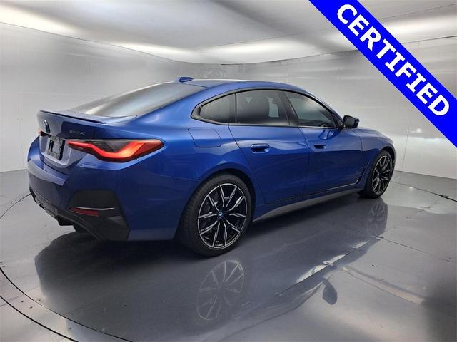 Photo of 2022 Portimao Blue Metallic BMW i4 Gran Coupe