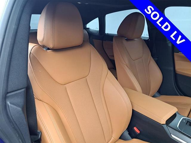 Photo of 2022 Portimao Blue Metallic BMW i4 Gran Coupe