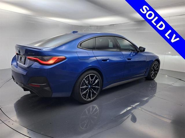 Photo of 2022 Portimao Blue Metallic BMW i4 Gran Coupe