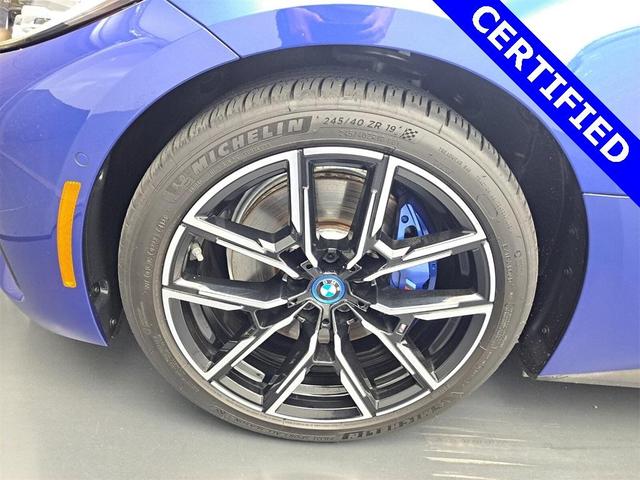 Photo of 2022 Portimao Blue Metallic BMW i4 Gran Coupe