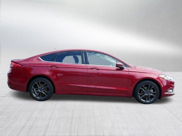 Photo of 2018 Ruby Red Metallic Tinted Clearcoat Ford Fusion