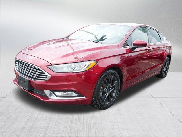 Photo of 2018 Ruby Red Metallic Tinted Clearcoat Ford Fusion