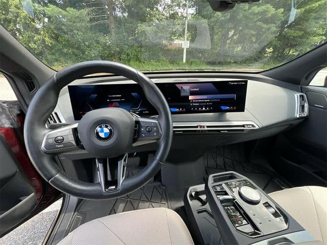Photo of 2025 Aventurin Red Metallic BMW iX