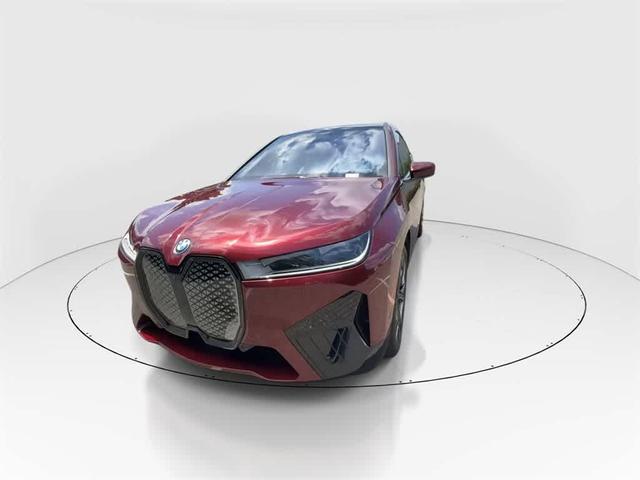 Photo of 2025 Aventurin Red Metallic BMW iX