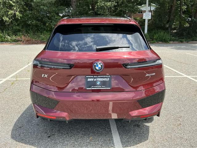 Photo of 2025 Aventurin Red Metallic BMW iX