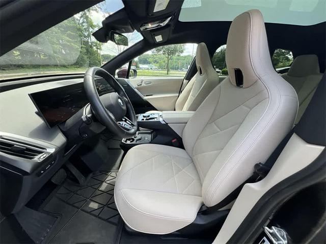 Photo of 2025 Aventurin Red Metallic BMW iX