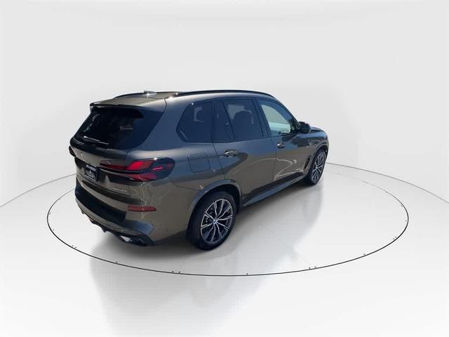 Photo of 2025 Manhattan Green Metallic BMW X5