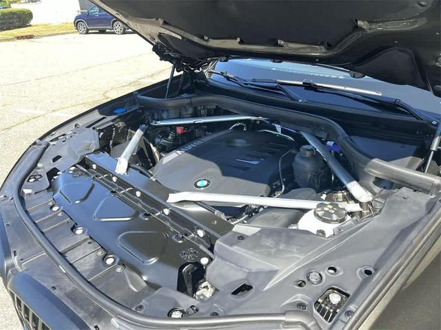 Photo of 2025 Manhattan Green Metallic BMW X5