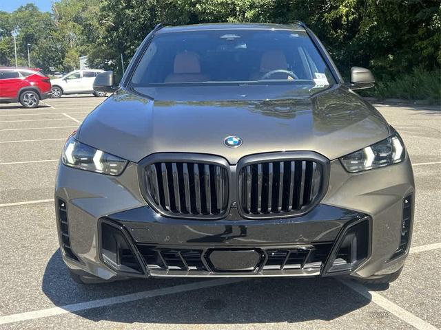 Photo of 2025 Manhattan Green Metallic BMW X5