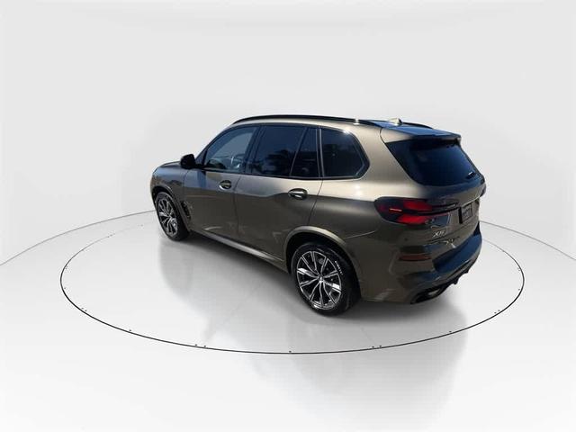 Photo of 2025 Manhattan Green Metallic BMW X5