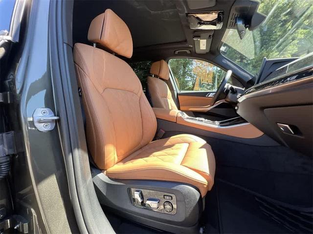 Photo of 2025 Manhattan Green Metallic BMW X5