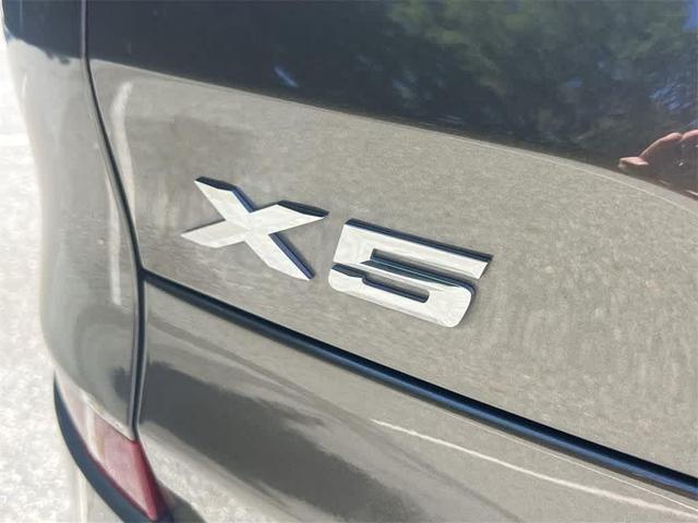 Photo of 2025 Manhattan Green Metallic BMW X5