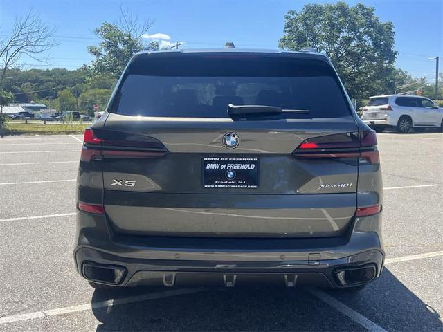 Photo of 2025 Manhattan Green Metallic BMW X5
