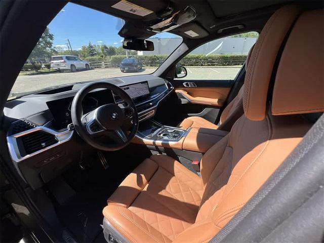 Photo of 2025 Manhattan Green Metallic BMW X5