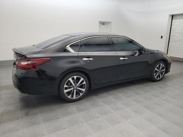 Photo of 2017 Super Black Nissan Altima