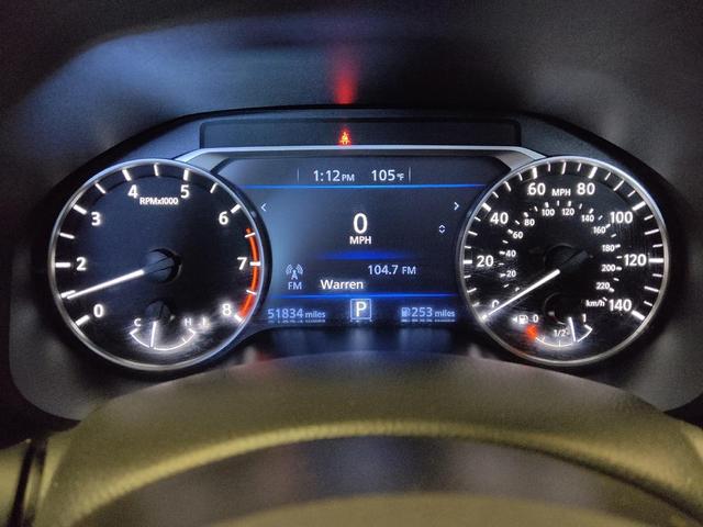 Photo of 2024 Pearl White Tricoat Nissan Altima