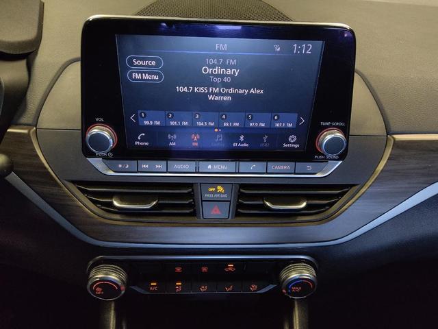 Photo of 2024 Pearl White Tricoat Nissan Altima