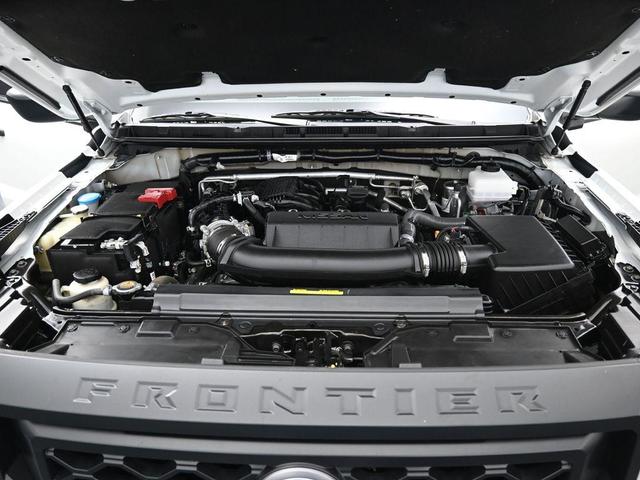 Photo of 2024 Glacier White Nissan Frontier