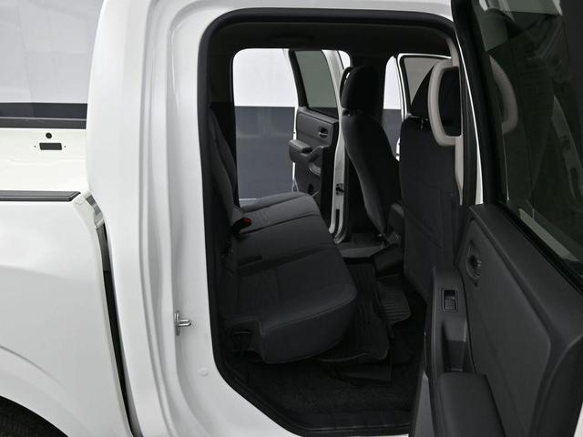 Photo of 2024 Glacier White Nissan Frontier