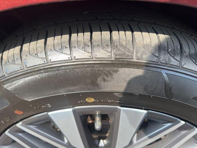 Photo of 2023 Garnet Pearl Nissan Altima
